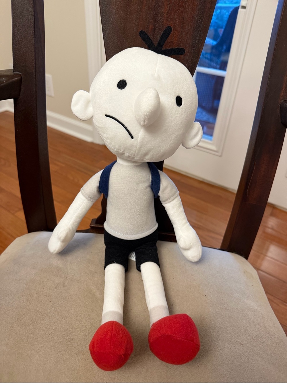 White Plush Character Doll with Red Shoes and Navy Backpack Accents